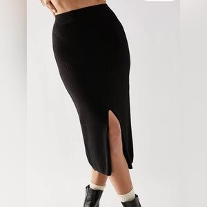 Free People Skyline Soft Midi Skirt front slit detailing. Elastic waist